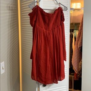 Red, strapless dress with sleeves